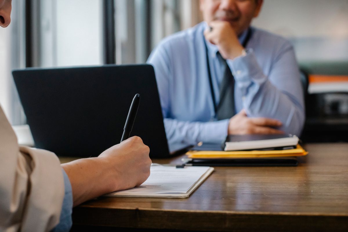 Accountant analysing business financial reports at a desk